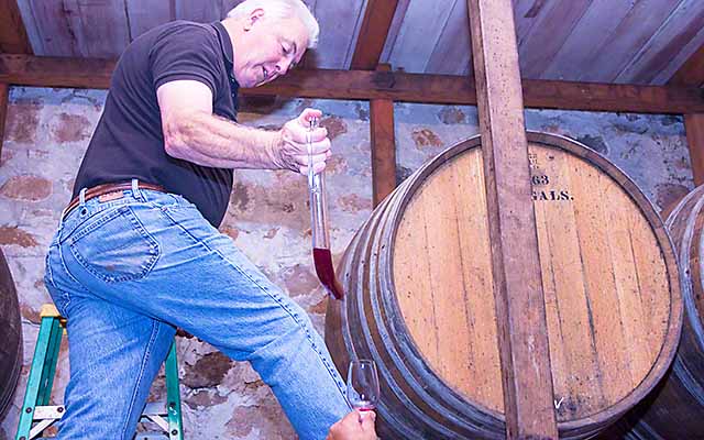 Mike Chelini pours a barrel sample of Cabernet Sauvignon